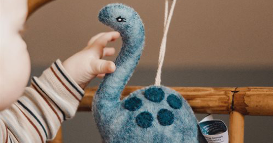 Musikuro med dinosaur